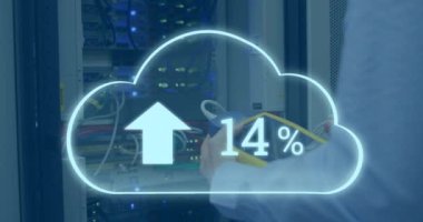 Animation of clouds icon over caucasian female worker inspecting server room. global technology and digital interface concept digitally generated video.