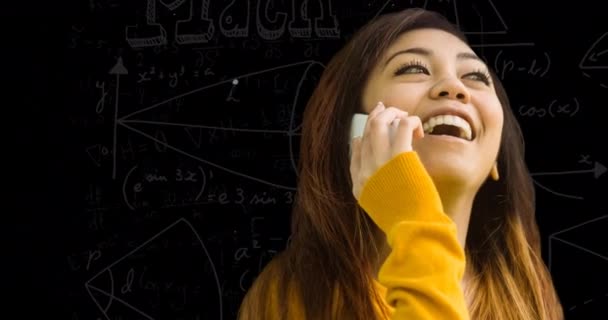 Animation Smiling Asian Woman Using Smartphone Maths Equations Black Background — Vídeos de Stock