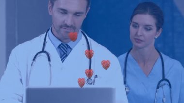 Kafkas erkek ve kadın doktorlara göre kalp animasyonu. Ulusal Kalp Günü ve dijital olarak üretilen video konsepti.