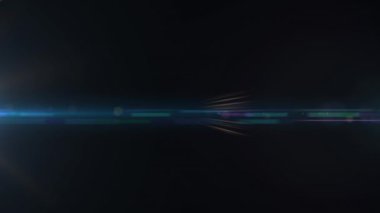 Animations of glowing lights over dark background. Lights, energy, movement and background concept digitally generated video.