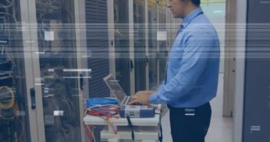 Animation of glitch over caucasian man checking servers. network, data processing and technology concept digitally generated video.