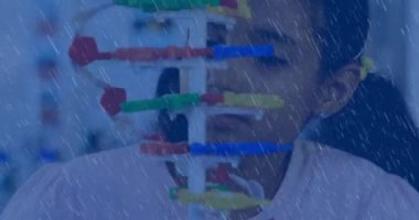 Animation of rain over biracial female student in lab. global science and digital interface concept digitally generated video.