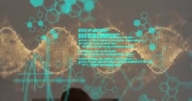Animation of data processing and dna strand over caucasian male and female doctor. global medicine, research, healthcare, digital interface and data processing concept digitally generated video