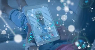 Animation of shapes over biracial female doctor having video call. global business and digital interface concept digitally generated video.