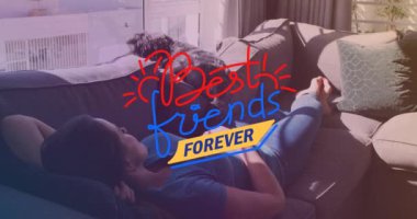 Animation of best friends forever text over caucasian woman lying with dog. National dog day and digital interface concept digitally generated video.