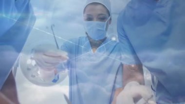 Hastanede ameliyat yapan bir grup farklı cerraha karşı olan bağlantılar. Sağlık ve tıbbi teknoloji kavramı