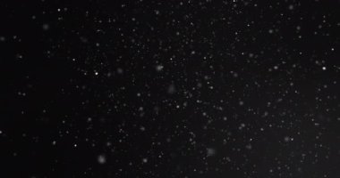 Siyah arka planda yüzen beyaz noktaların animasyonu. arkaplan, dokular ve hareket konsepti dijital olarak oluşturulmuş video.