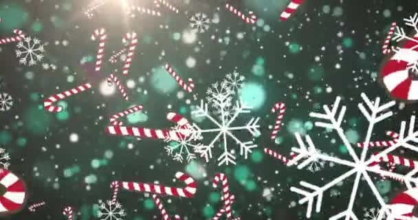 雪和圣诞糖果手杖的动画飘落在绿色的背景上 圣诞节 传统和庆祝概念数码制作的视频 — 图库视频影像