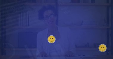 Animation of social media smiley emojis over biracial woman on video call. global connections, data processing and technology concept digitally generated video.