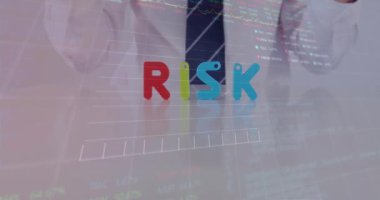 Animation of data processing over caucasian businessman with risk text. Global business and digital interface concept digitally generated video.