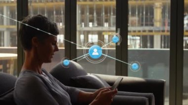 Animation of network of connections over caucasian businesswoman using smartphone. global business, connections and digital interface concept digitally generated video.