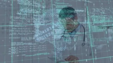 Animation of data processing over caucasian male doctor with tablet. Health, medicine, data processing and technology concept digitally generated video.