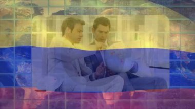 Animation of financial data processing and business people over flag of columbia. Global business, finance, data processing and networking concept digitally generated video.
