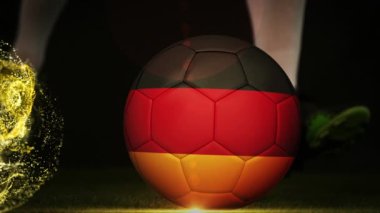 Beyaz erkek futbolcunun bacakları üzerinde Alman bayrağıyla topa tekme attığı animasyon. Spor, rekabet ve dijital olarak üretilen video konsepti.