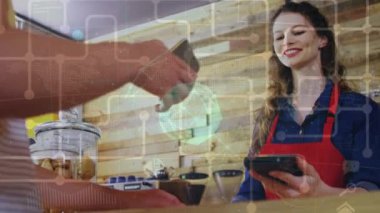 Bağlantılar ağı ve akıllı telefonuyla ödeme yapan bir adamın orta bölümündeki dünya çapındaki bağlantıları. Nft ve dijital ödeme teknolojisi kavramı