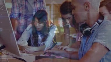 Animation of network of connections over diverse businesspeople in office. Business, network, connections and cooperation concept digitally generated video.