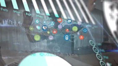 Animation of data processing and social media icons over caucasian man using vr headset. Global technology and digital interface concept digitally generated video.