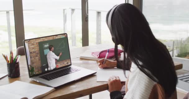 Biracial Teenage Girl Using Laptop Video Call Male Teacher Screen — 图库视频影像