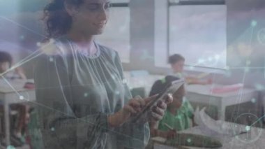 Animation of network of connections over diverse schoolchildren and teacher using tablet. Global connections, education and digital interface concept digitally generated video.
