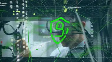 Animation od digital padlock, screens and data processing over caucasian man checking servers. Network, computers and technology concept digitally generated video.