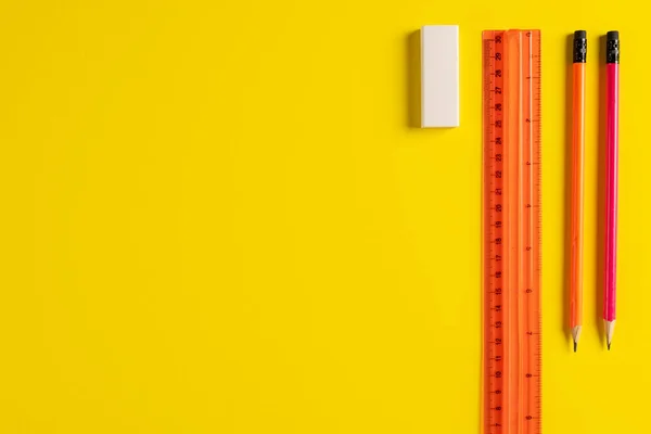Image Pencils Eraser Ruler Yellow Background Copy Space School Equipment — Foto de Stock