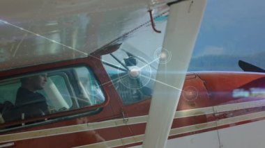 Uçaktaki pilot üzerinden bağlantı ağının animasyonu. Küresel spor yarışması veri işleme kavramı dijital olarak oluşturulmuş video bağlantıları.