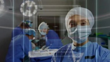 Ameliyat sırasında çeşitli cerrahların üzerinde hareket eden şekillerin animasyonu. Küresel tıp ve dijital arayüz kavramı dijital olarak oluşturulmuş video.