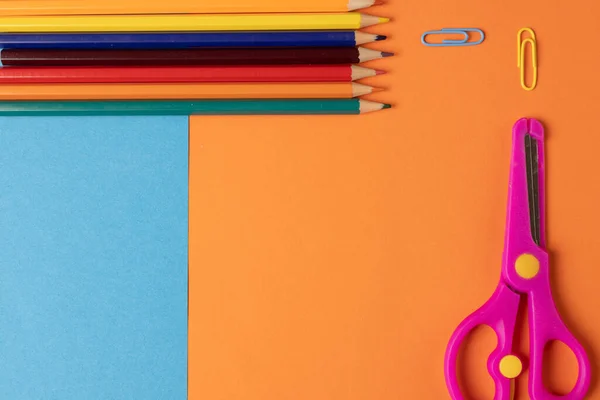 Composition Crayons Scissors Clips Blue Orange Surface School Equipment Tools — Stockfoto