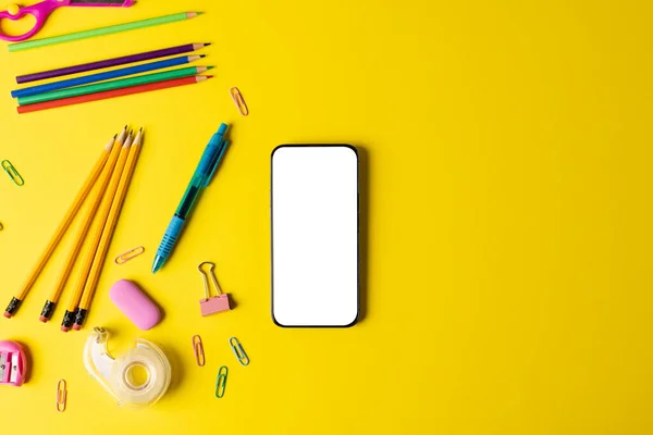 Composition School Equipment Smartphone Copy Space Yellow Surface School Equipment — Stockfoto