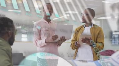 Animation of statistics and financial data processing over man working in warehouse. Global business networking and teamwork concept digitally generated video.