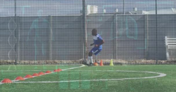 Animation Interface Processing Data Biracial Male Footballer Training Running Pitch — стоковое видео