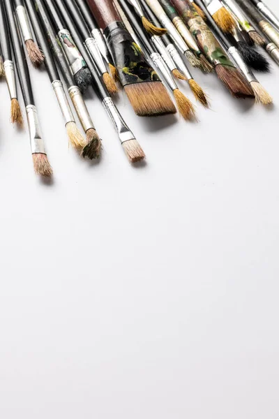 Vertical Image Composition Diverse Brushes White Surface Copy Space School — Stock Photo, Image