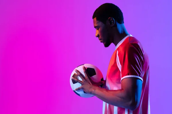 African American Male Soccer Player Football Neon Pink Lighting Sport — Stock fotografie