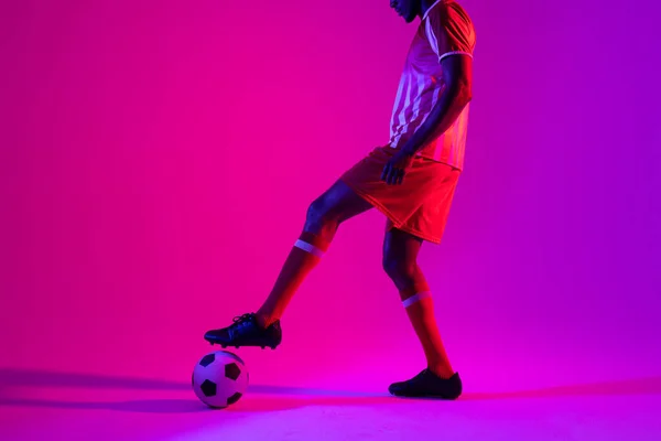 African American Male Soccer Player Football Neon Pink Lighting Sport — Φωτογραφία Αρχείου