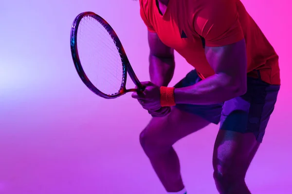 Image Midsection African American Male Tennis Player Neon Violet Lighting — Stockfoto