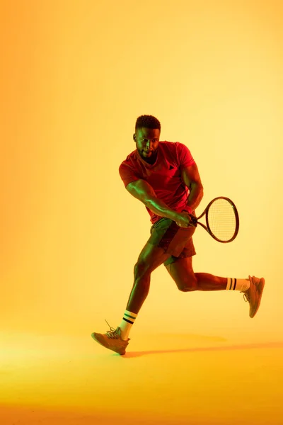 Vertical Image African American Male Tennis Player Hitting Ball Yellow — Stok fotoğraf