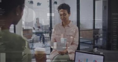 Animation of data processing over diverse business people in office. Global business and digital interface concept digitally generated video.
