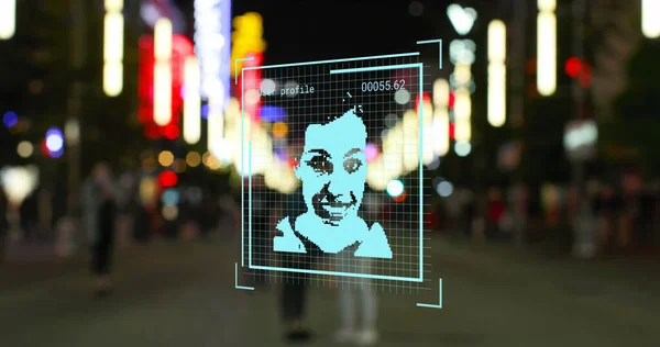 Image of digital profile portraits processing over city street at night. Global communication, travel and digital interface concept digitally generated image.