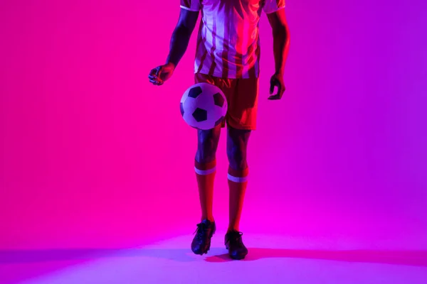 African American Male Soccer Player Football Neon Pink Lighting Sport — Stok fotoğraf