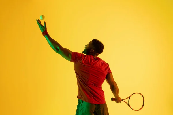 Image Happy African American Male Tennis Player Yellow Lighting Sport — Stockfoto