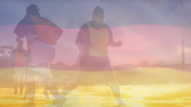Çeşitli kadın rugby oyuncuları üzerinde Alman bayrağının animasyonu. Küresel spor ve ulusal bayraklar konsepti dijital olarak oluşturulmuş video.
