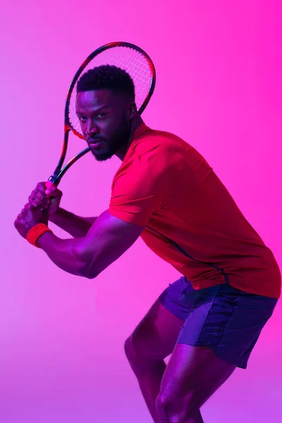 Vertical Image African American Male Tennis Player Neon Pink Lighting — Stok fotoğraf