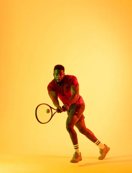 Vertical Image African American Male Tennis Player Hitting Ball Yellow — Stok fotoğraf