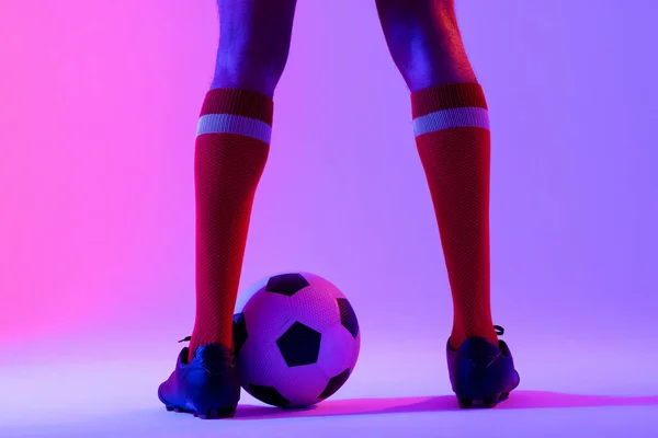 African American Male Soccer Player Football Neon Pink Lighting Sport — Zdjęcie stockowe
