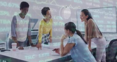 Animation of financial data and graphs over diverse female coworkers in office. Business, finance, economy and cooperation concept digitally generated video.