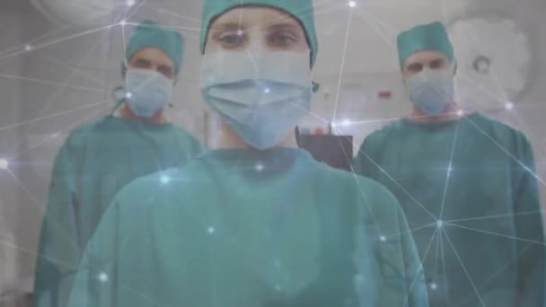 Animation Network Connections Caucasian Female Male Surgeons Looking Camera Health — Vídeo de stock