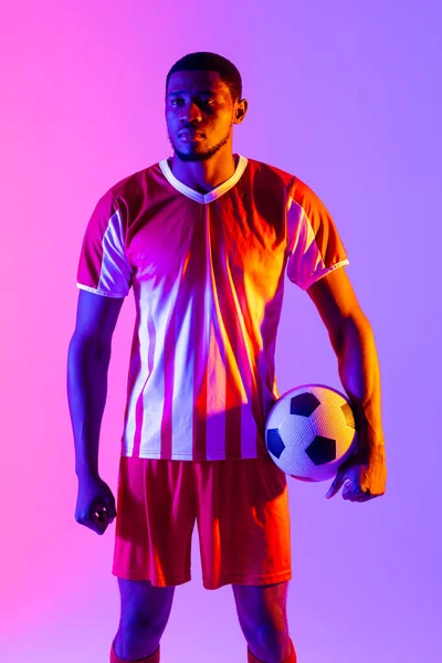 African American Male Soccer Player Football Neon Pink Lighting Sport — Photo