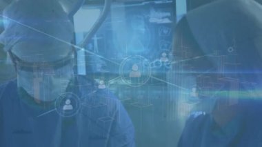 Operasyon sırasında çeşitli cerrahlar üzerindeki bağlantı ağının animasyonu. Dijital olarak üretilen sağlık, tıp, bağlantılar ve teknoloji konsepti.