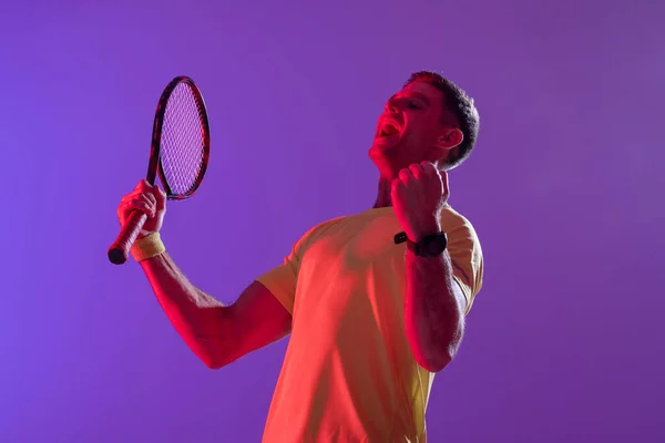 Happy Caucasian Male Tennis Player Tennis Racket Neon Pink Lighting — Stockfoto