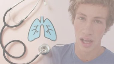Animation of caucasian man with inhaler over lungs and stethoscope. Global medicine and world copd awareness day concept digitally generated video.